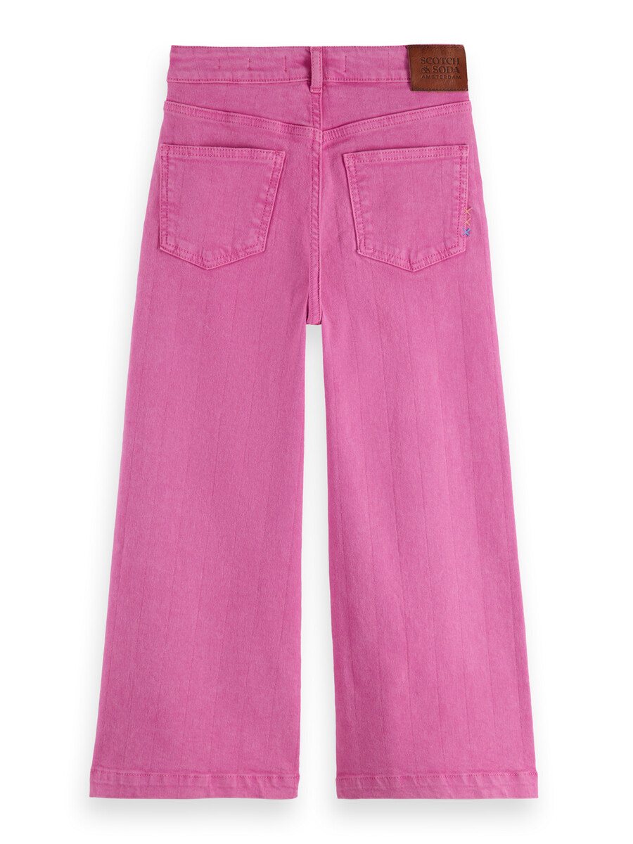 flickjeans med vida ben i färgade plagg