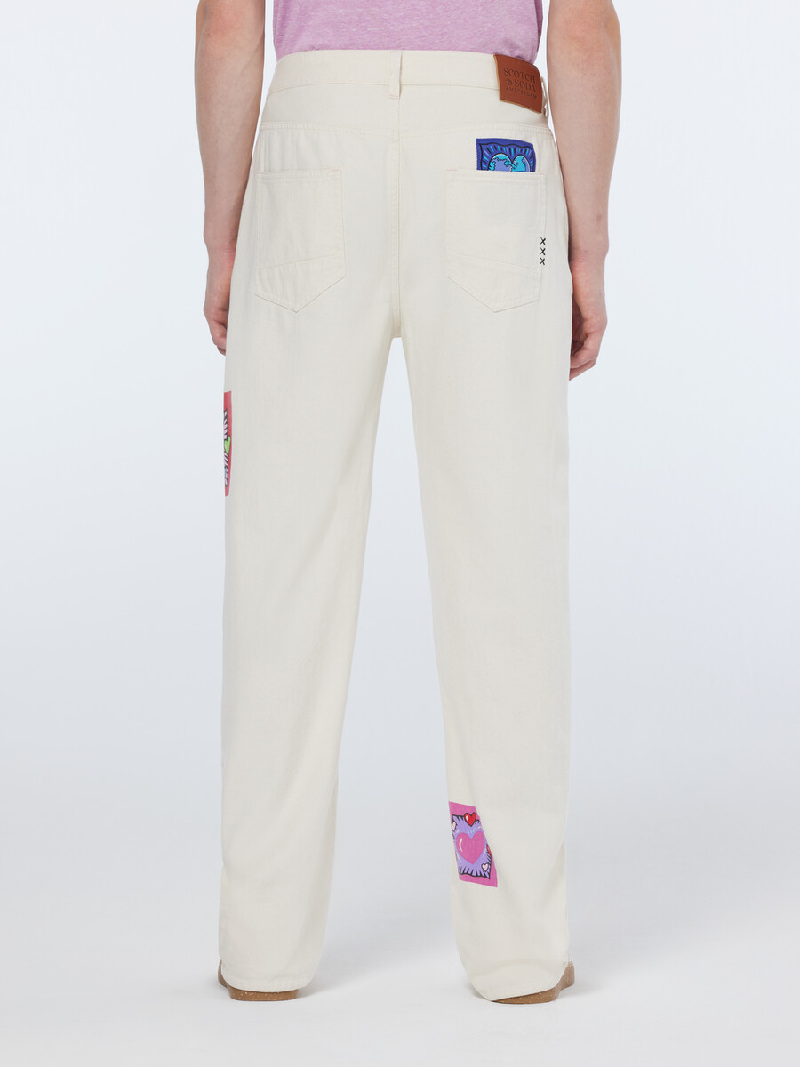 scotch soda x burton morris unisex raka jeans ecru love