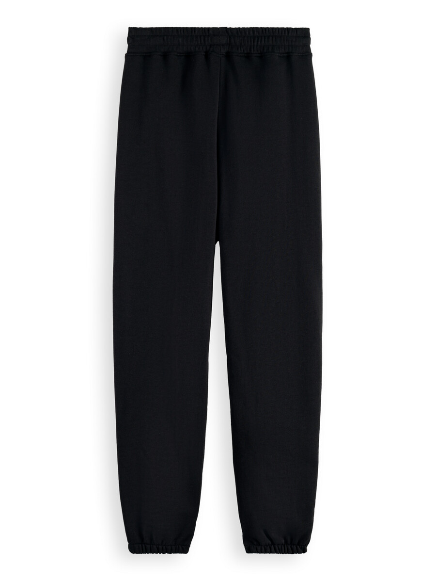 essentials — joggingbyxor med avslappnad passform och flatlock-effekt
