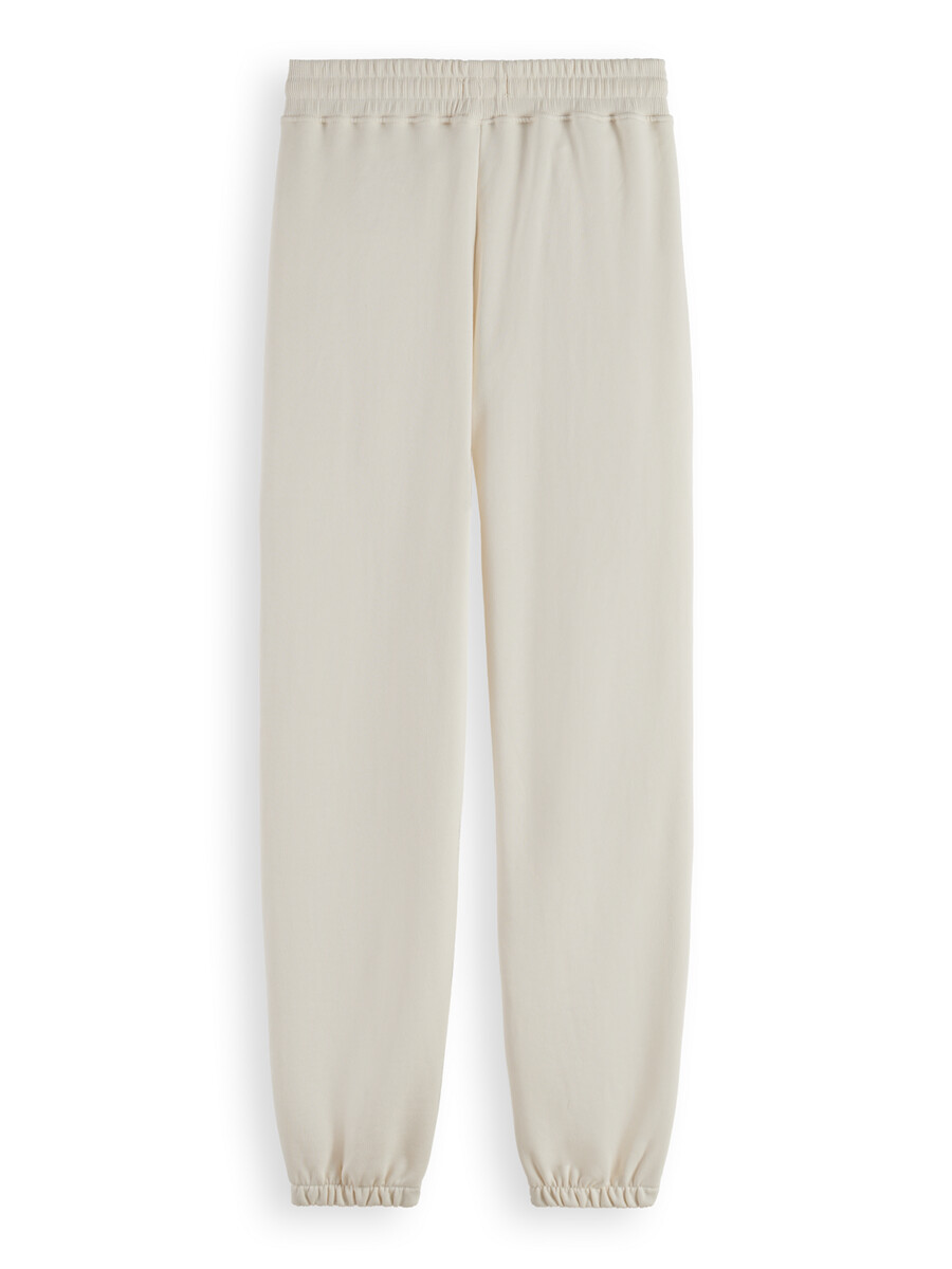essentials — joggingbyxor med avslappnad passform och flatlock-effekt