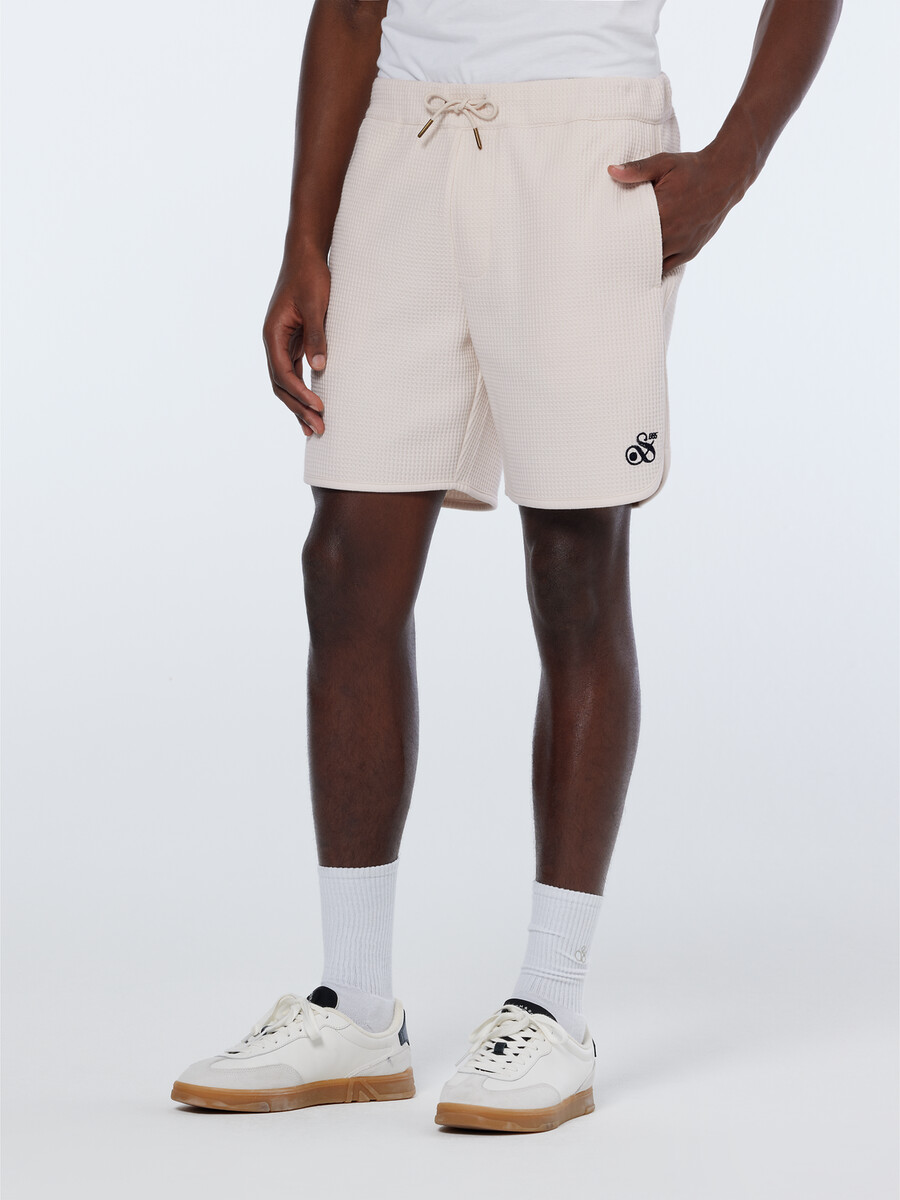 bermudashorts med sportig våffelmönster och avslappnad passform